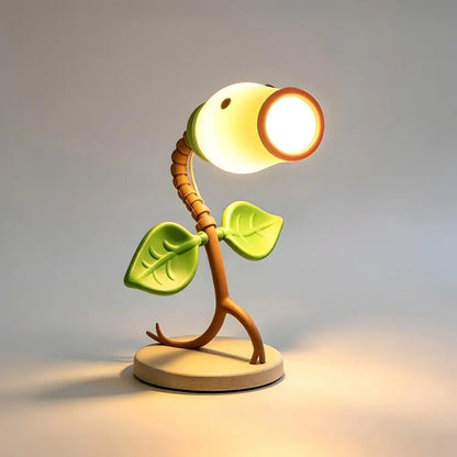 Custom 3D printed Bellsprout night light with glowing head and flexible stem on neutral studio background