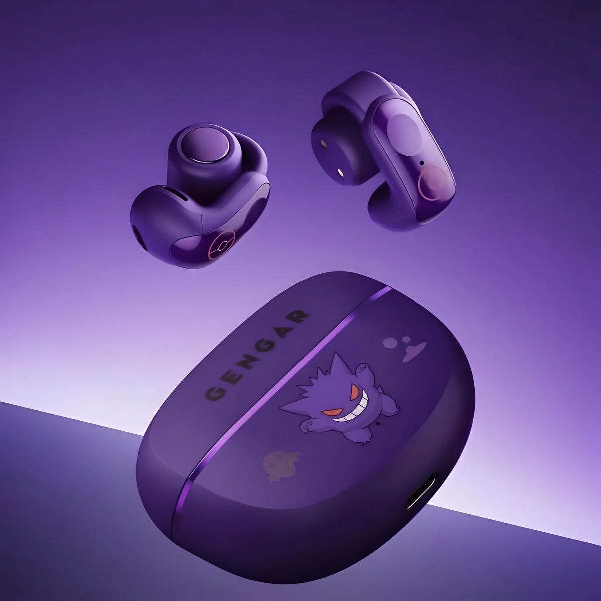 Purple Gengar wireless earbuds floating above matching charging case with USB-C port
