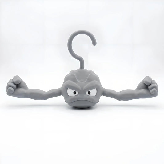 Gray Geodude clothes hanger shaped like the anime rock monster with flexed muscular arms on a white background.