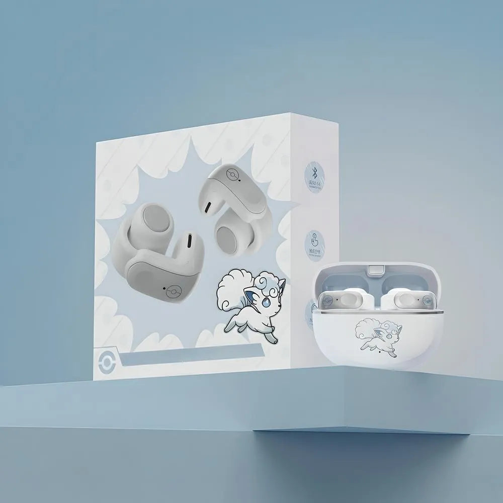 Official Pokémon Alolan Vulpix clip-on Bluetooth earbuds packaging box with open charging case displaying the earbuds on a light blue display stand.