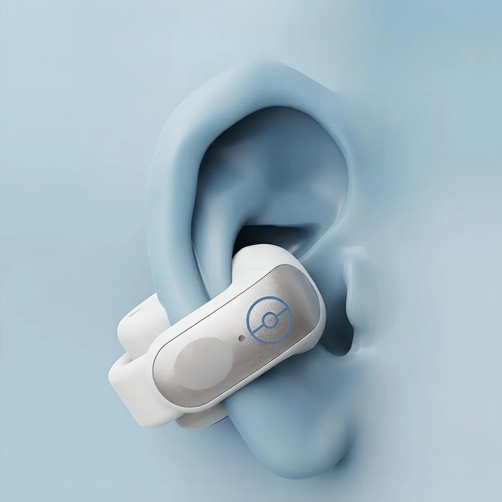 Close-up shot of an open-ear clip-on Bluetooth earbud in sleek white and silver metallic finish, comfortably fitted on a human ear model with Pokéball logo accent.